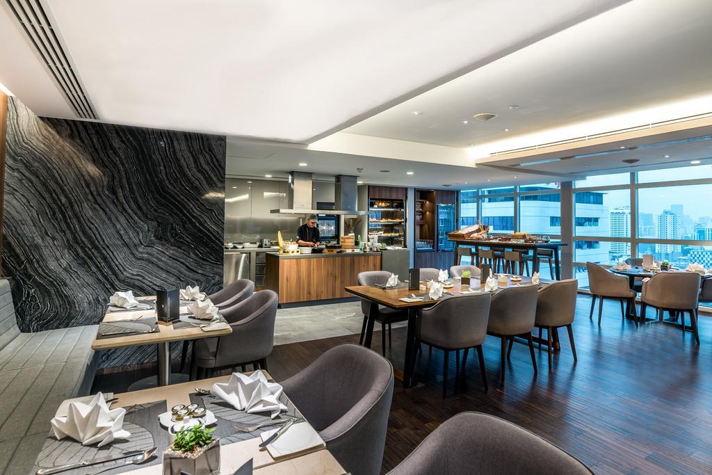 Отель Pullman Bangkok King Power Экстерьер фото The Wing at Hong Kong International Airport